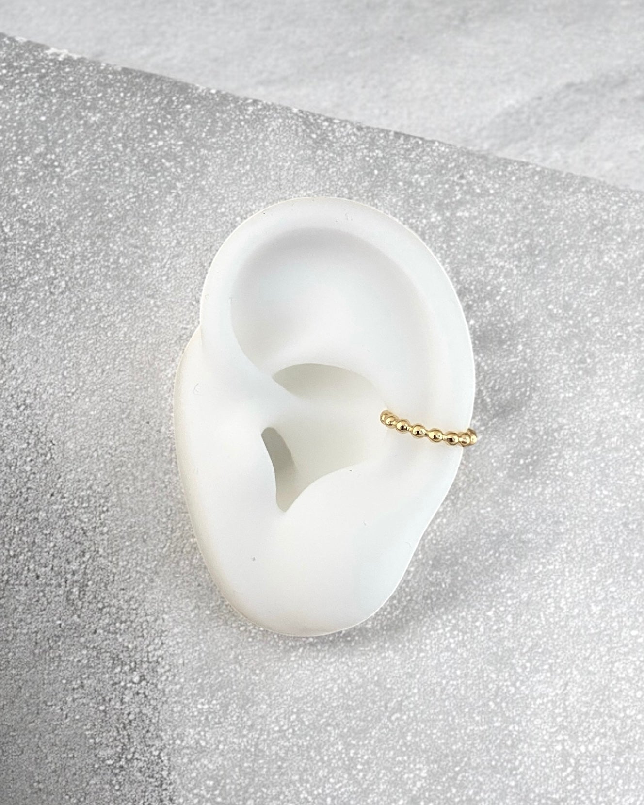 Ear Cuff Esferas Dorado